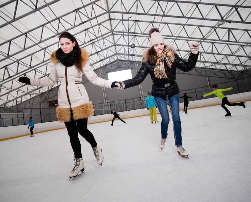 Girls on iceskating rink stock image. Image of skaters 49410423