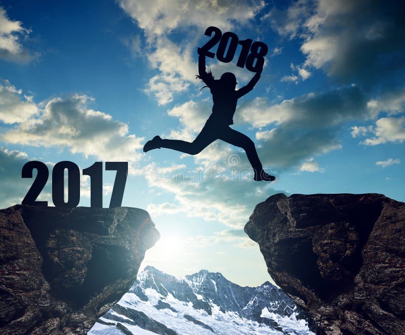 Girls jump to the New Year 2018 royalty free stock photo Girls jump to the New Year 2018 royalty free stock photo