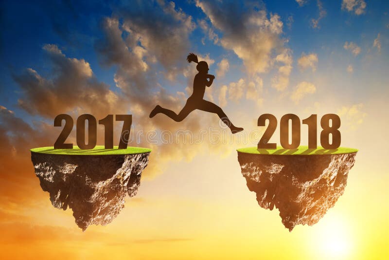 Girls jump to the New Year 2018 royalty free stock photo Girls jump to the New Year 2018 royalty free stock photo