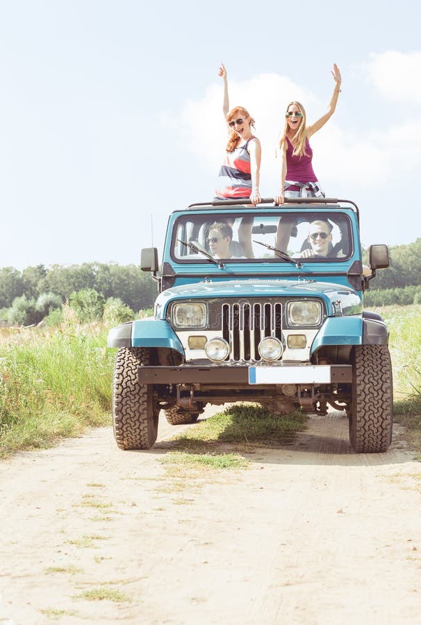 Girls in off-road vehicle