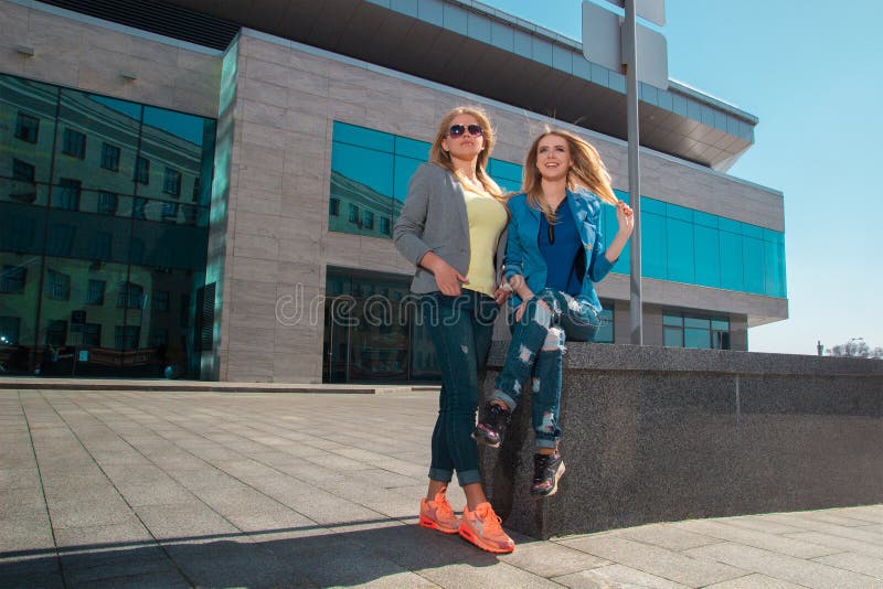 Girls posing outdoors stock photography