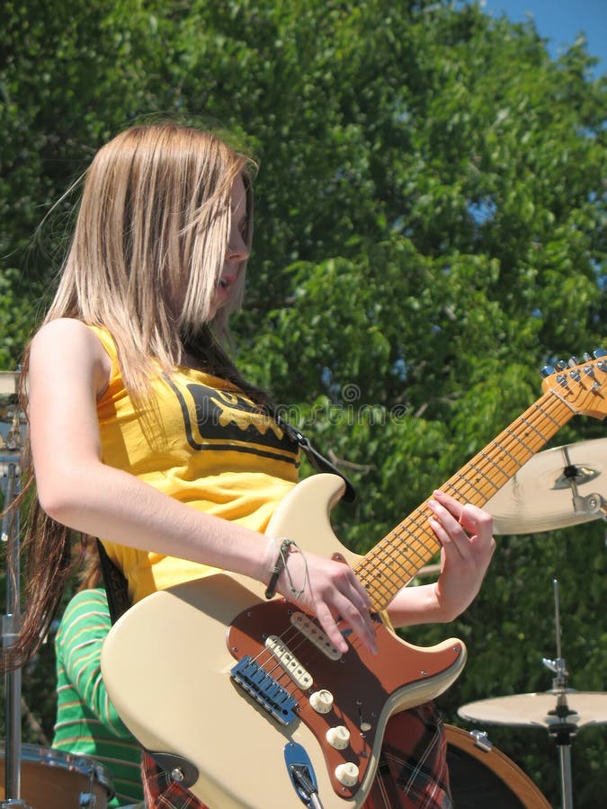 Girls rock band on stage stock image Girls rock band on stage stock image