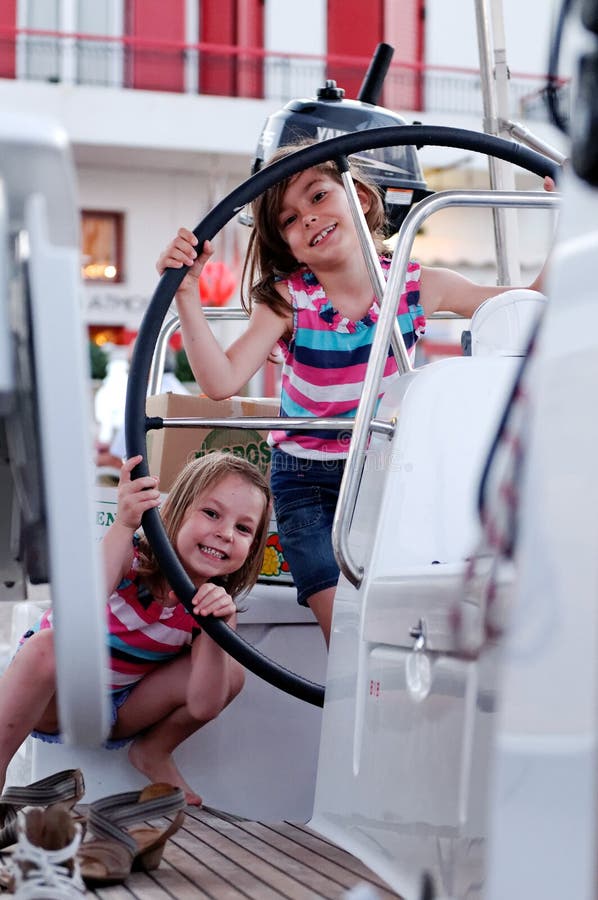 Girls on sailing boat stock photo. Image of children 