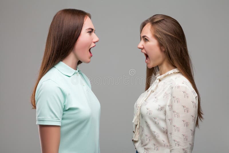 Girls Screams At Each Other Studio Photo Shoot Stock Photo