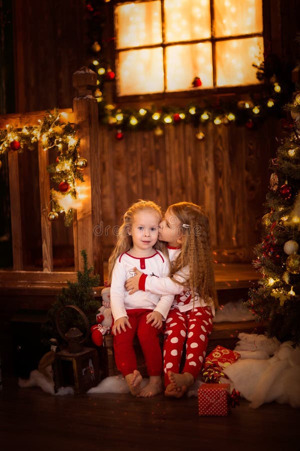 Girls Sister Friends Hugging Sitting at Christmas Tree, Concept Stock ...