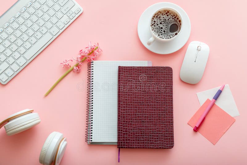 Girly Desktop with Notepads Computer Headphones Cup of Coffee on Pink Color  Background. Work Office Space Stock Photo - Image of stationery, space:  221771022