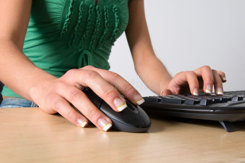 Girl’s hand on mouse