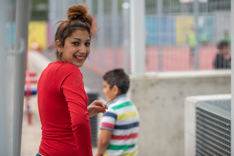 Brno, Czech Republic. 06-11-2016. Adolescents having fun at a Festival of Roma people Gypsies in Brno attended by people from the community, with activities for children and adolescents. Brno, Czech Republic. 06-11-2016. Adolescents having fun at a Festival of Roma people Gypsies in Brno attended by people from the community, with activities for children and adolescents