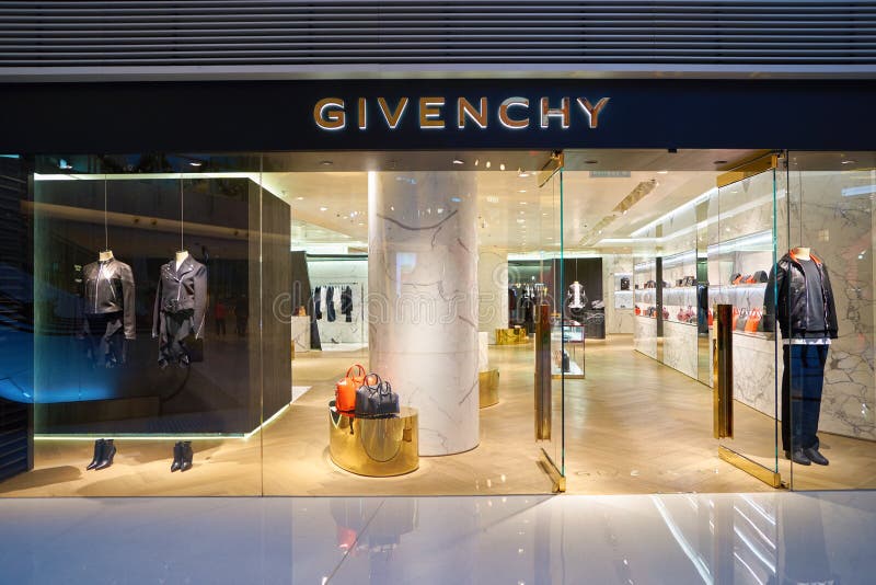 Security Guards At The Entrance Of Givenchy Store Stock Photo