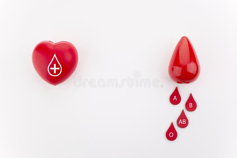 Giving blood saves live. Blood Donation concept. Red heart and blood drop on white background