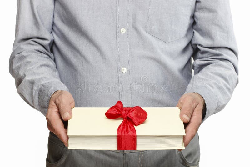 Giving book as a present stock photo. Image of father 38261560