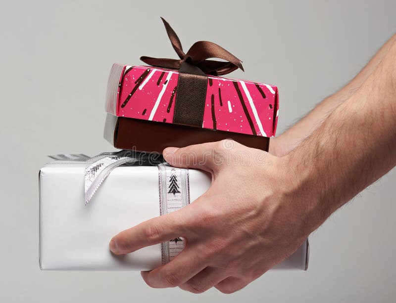 Giving gift boxes stock photo. Image of christmas, ribbon 83116210