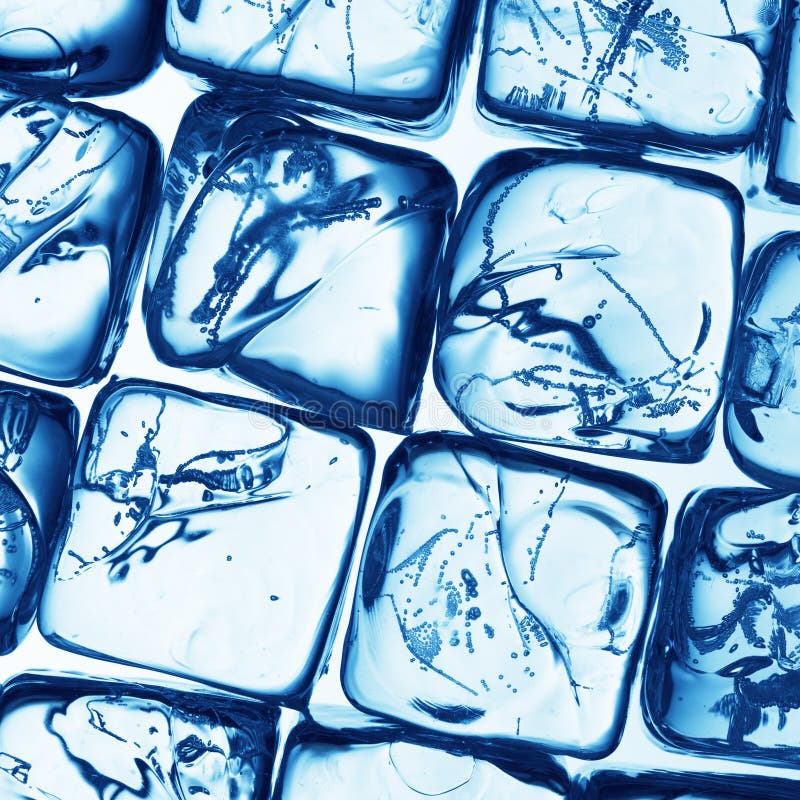 A background of ice cubes lit in blue light. A background of ice cubes lit in blue light.