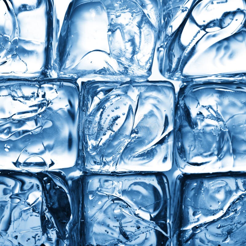 A background of ice cubes lit in blue light. A background of ice cubes lit in blue light.