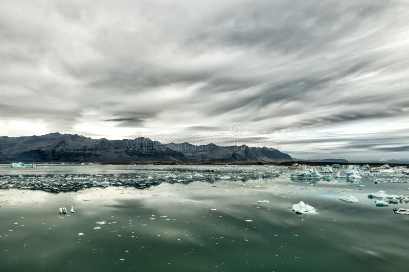 Glacial lake. Gloomy dramatic landscape of Iceland. royalty free stock photos