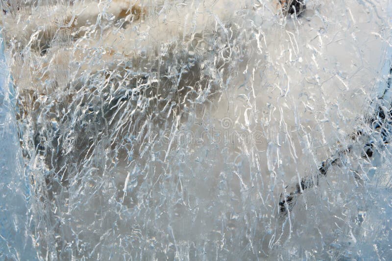 Glacial transparent block of ice with patterns. royalty free stock images Glacial transparent block of ice with patterns. royalty free stock images