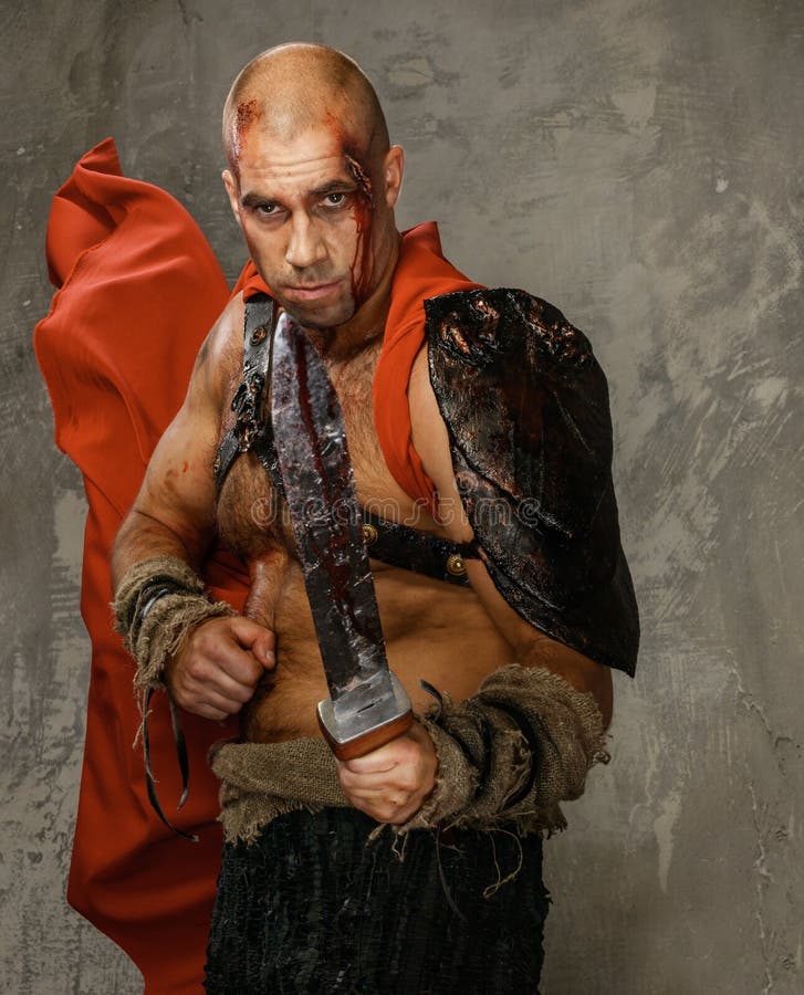Gladiateur blessé avec l'épée photos libres de droits Gladiateur blessé avec l'épée photos libres de droits
