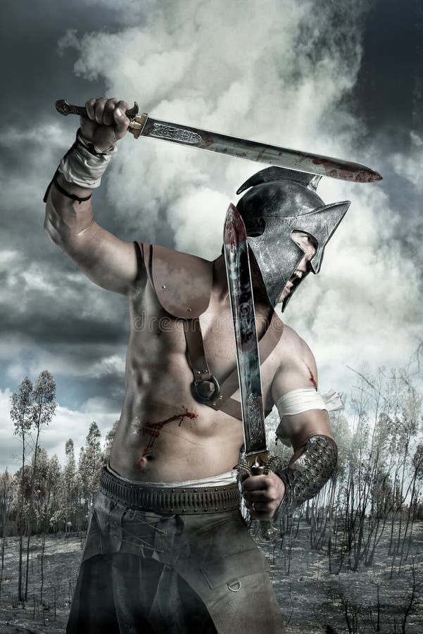 Gladiator in einem Kampf lizenzfreies stockbild Gladiator in einem Kampf lizenzfreies stockbild