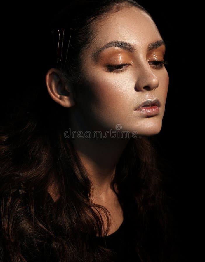 Glamor woman dark face portrait, beautiful female on black background