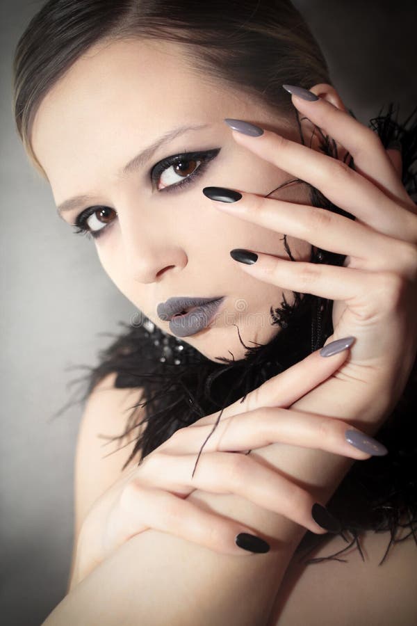 Black gray glam matte manicure and makeup. stock images