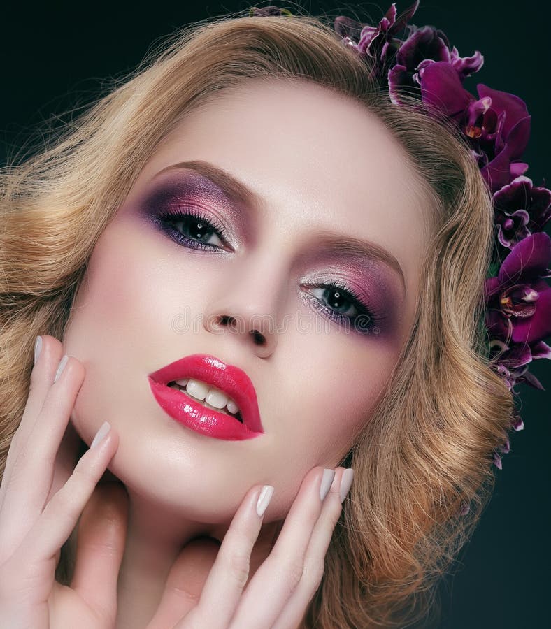 Glance. Sensual Woman with Glamorous Trendy Makeup