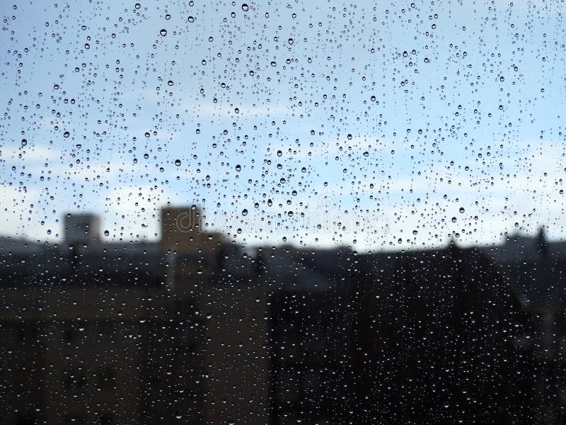 Glas eines Fensters naß vom Regen stockfotografie Glas eines Fensters naß vom Regen stockfotografie