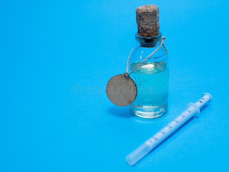 Glas flask with medical anti flu cold potion royalty free stock photography Glas flask with medical anti flu cold potion royalty free stock photography