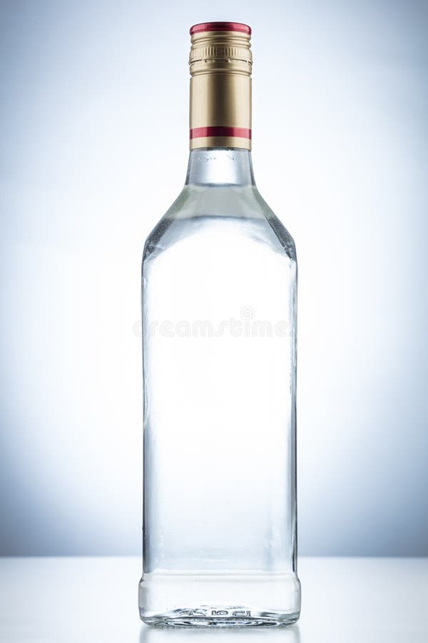 Glasflasche des leeren Alkohols lizenzfreies stockbild Glasflasche des leeren Alkohols lizenzfreies stockbild