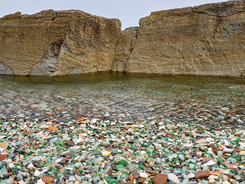Glaskiezelstenen op de kust stock afbeelding Glaskiezelstenen op de kust stock afbeelding
