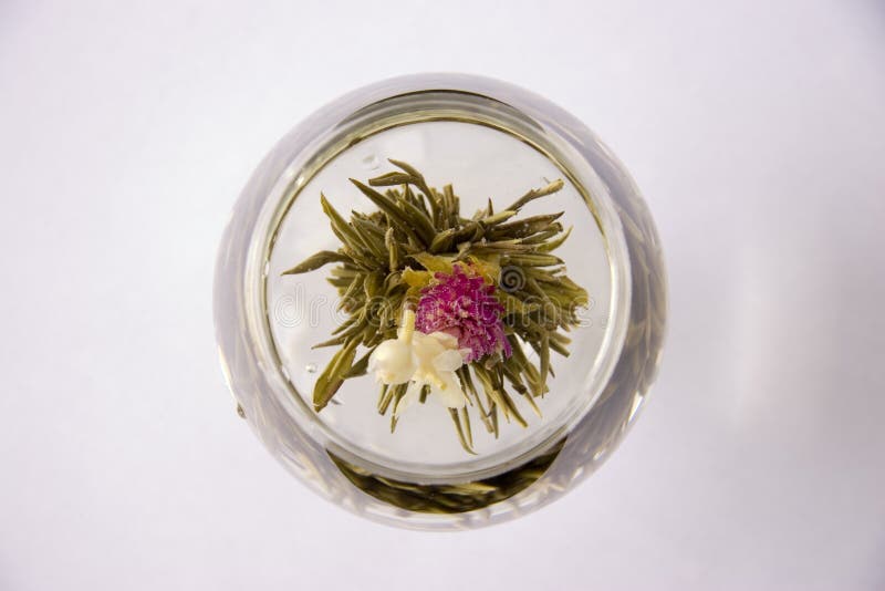 A glass of artisan blooming tea