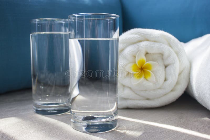A glass beaker with clear water. The concept of SPA.