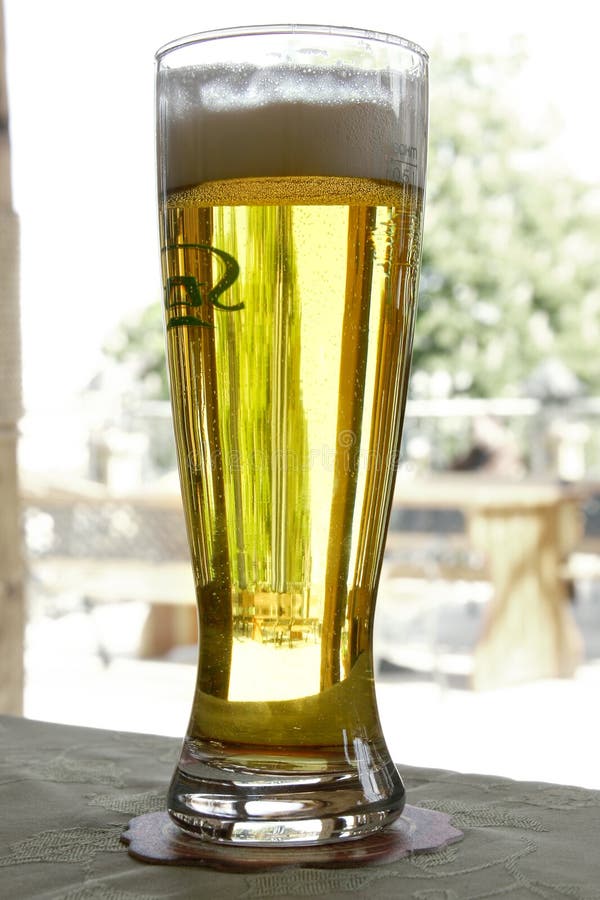 Glass of beer stock photo. Image of light, close, beer 2396622