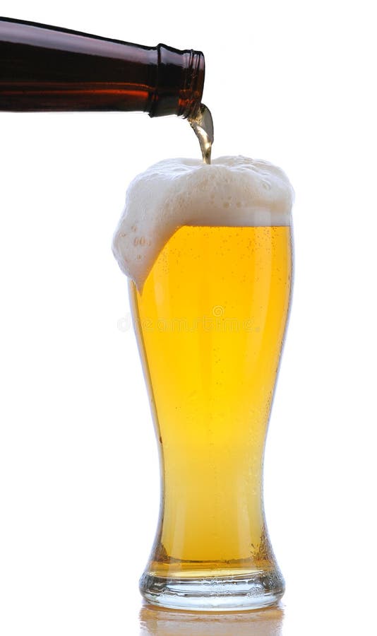 Glass of Beer Being Poured stock photo. Image of lager 10670416
