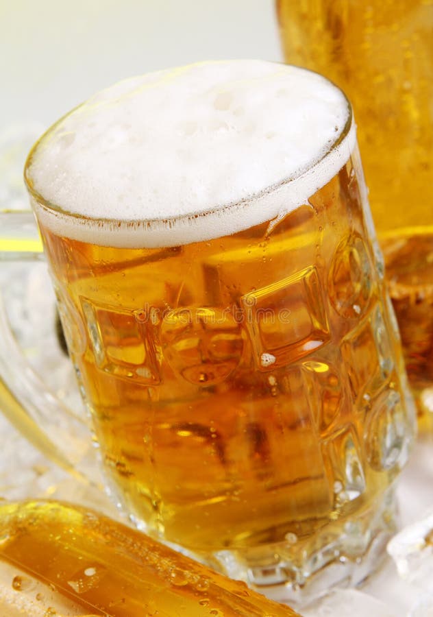 Glass of beer with foam stock photo. Image of condensation 19820830