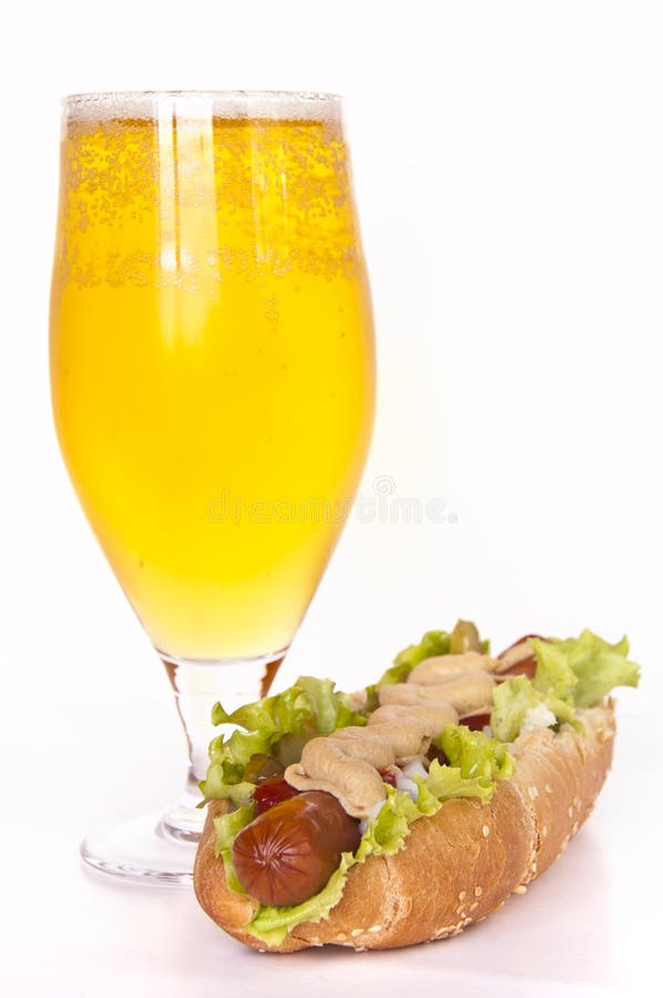 Glass of beer and hot dog stock photo. Image of background 19961186