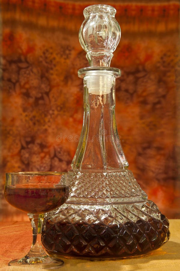 Glass and bottle of brandy stock photo. Image of wine 25472686