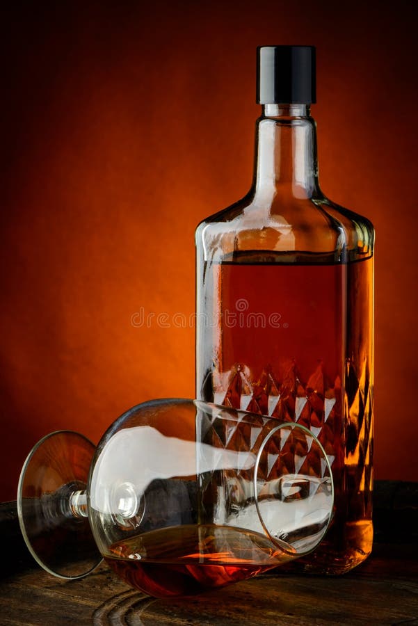 Glass and bottle of brandy