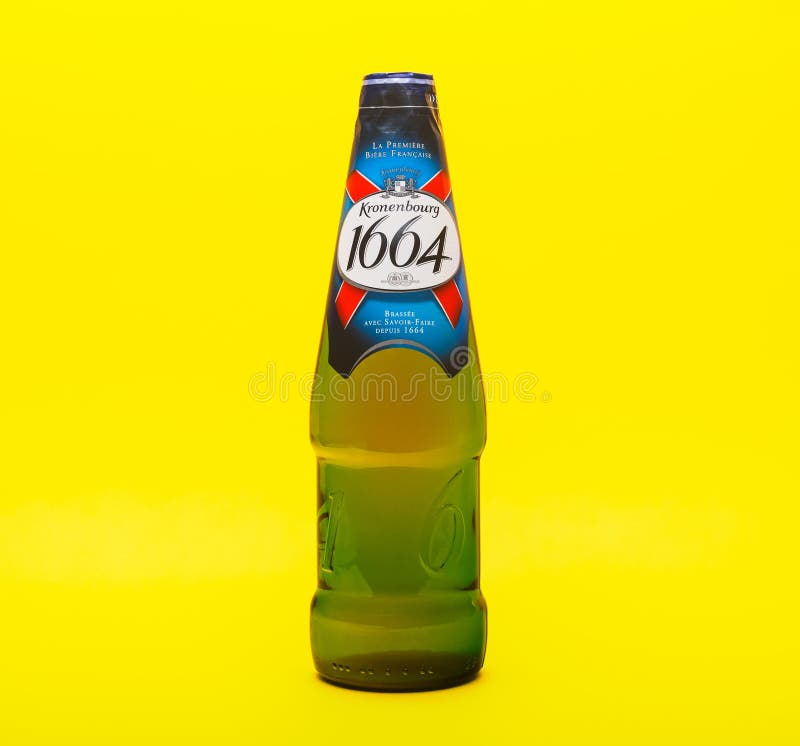 Glass Bottle Kronenbourg 1664 Beer on a Yellow Background. Light Beer is the Main Brand of Kronenbourg Brewery, Owned by the Editorial Stock Photo Image of glass, germany: 190772393
