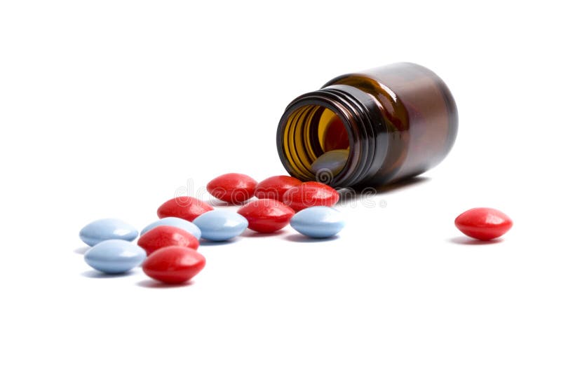 Glass bottle with red and blue pills