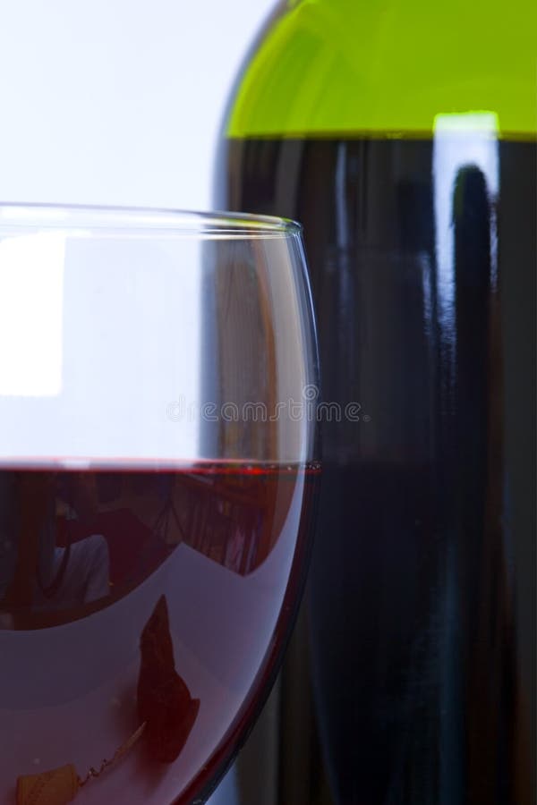 Glass and bottle of red wine