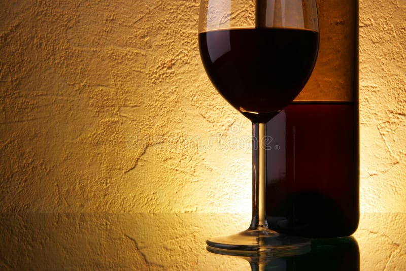 Glass and bottle with wine stock image. Image of event 4513933