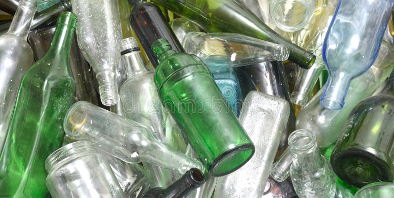 Glass bottles inside a glass recycling