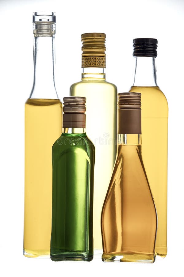 Glass Bottles with Various Grades of Vegetable Oil Stock Image Image