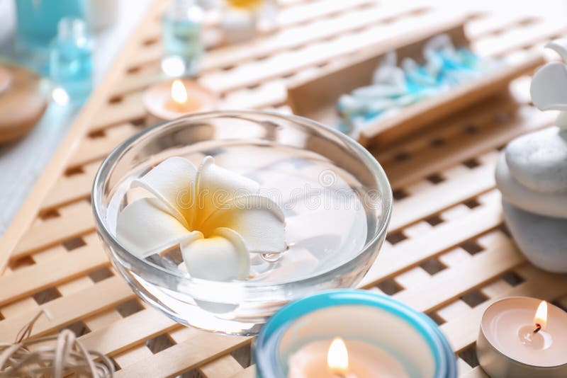 Glass Bowl With Floating Flower In Water On Table Stock Image Image of hygiene, lifestyle