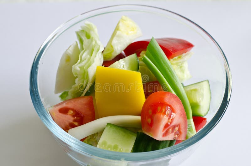 Glass bowl of fresh salad stock photo. Image of bistro 24742084