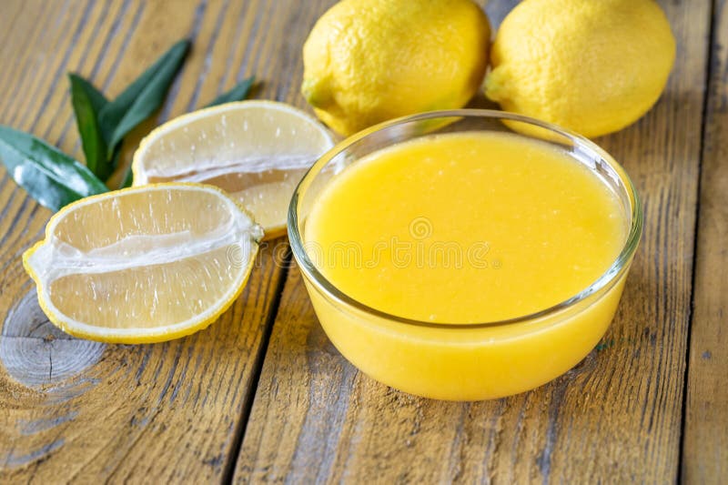 Glass bowl of lemon curd stock photo. Image of food 190584930