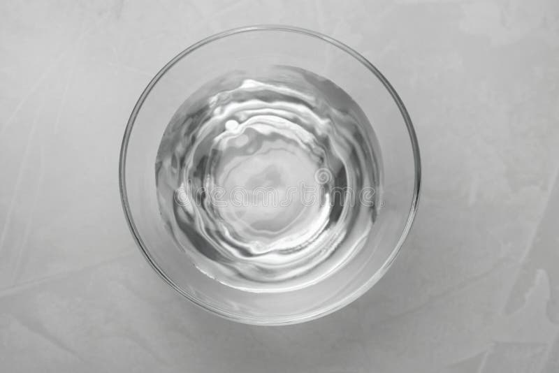 Glass Bowl with Water on Grey Table, Top View Stock Image Image of