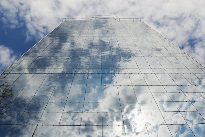 Glass-building, sky and clouds