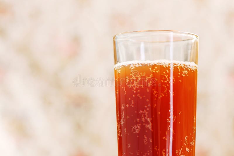 Glass with carbonated drink