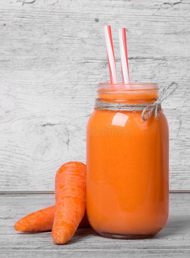 Carrot juice smoothie jug, paths Stock Photo by maxsol7